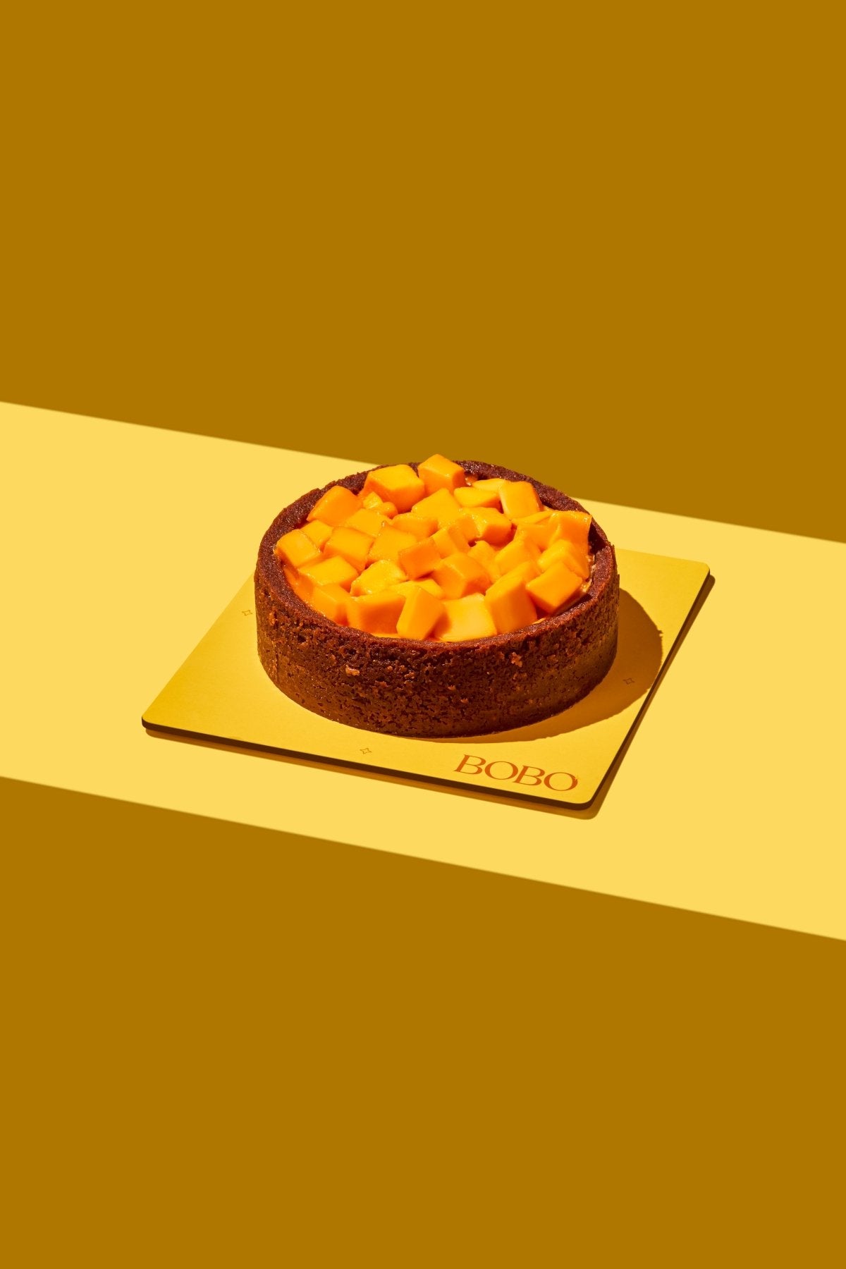 0.5 Kg Eggless Mango Cheesecake - Bobo Cakery