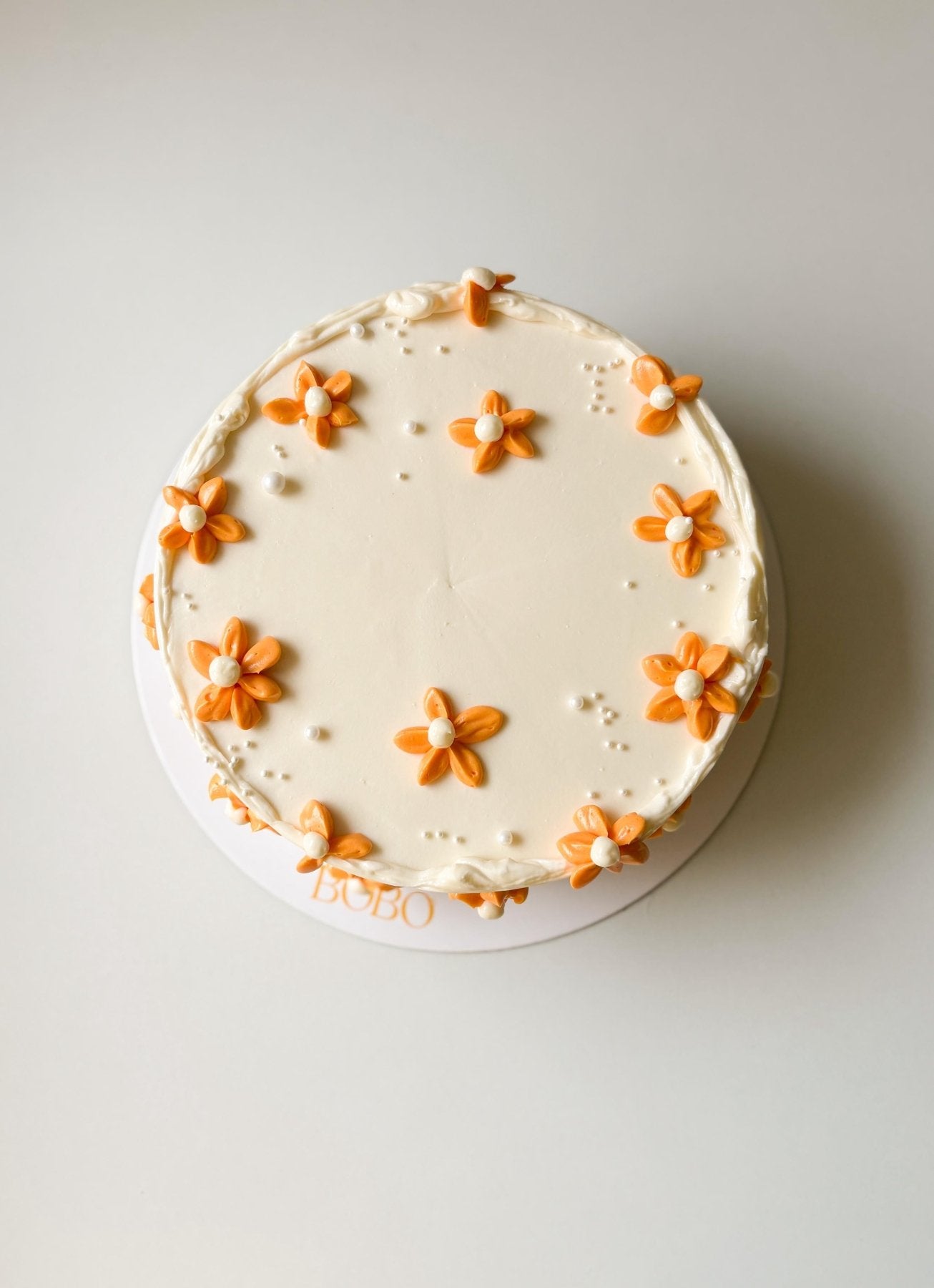 Piped Daisy Cake - Bobo Cakery